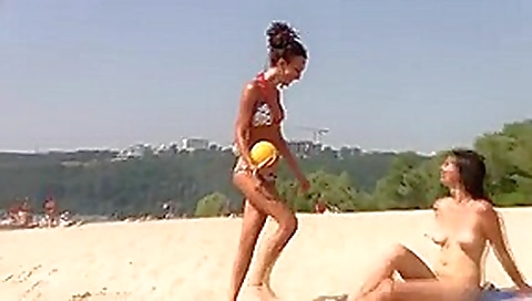 Nudist beach brings the best out of two hot girls Nudist beach brings the best out of two hot girls