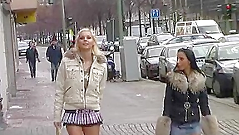 Tall blonde and small brunette lesbians in public