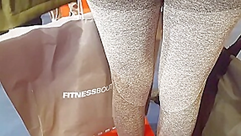 Two candid fit asses in grey yoga pants walking Two candid fit asses in grey yoga pants walking