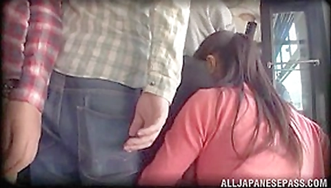 Hot Asian milf gets group action in a public place